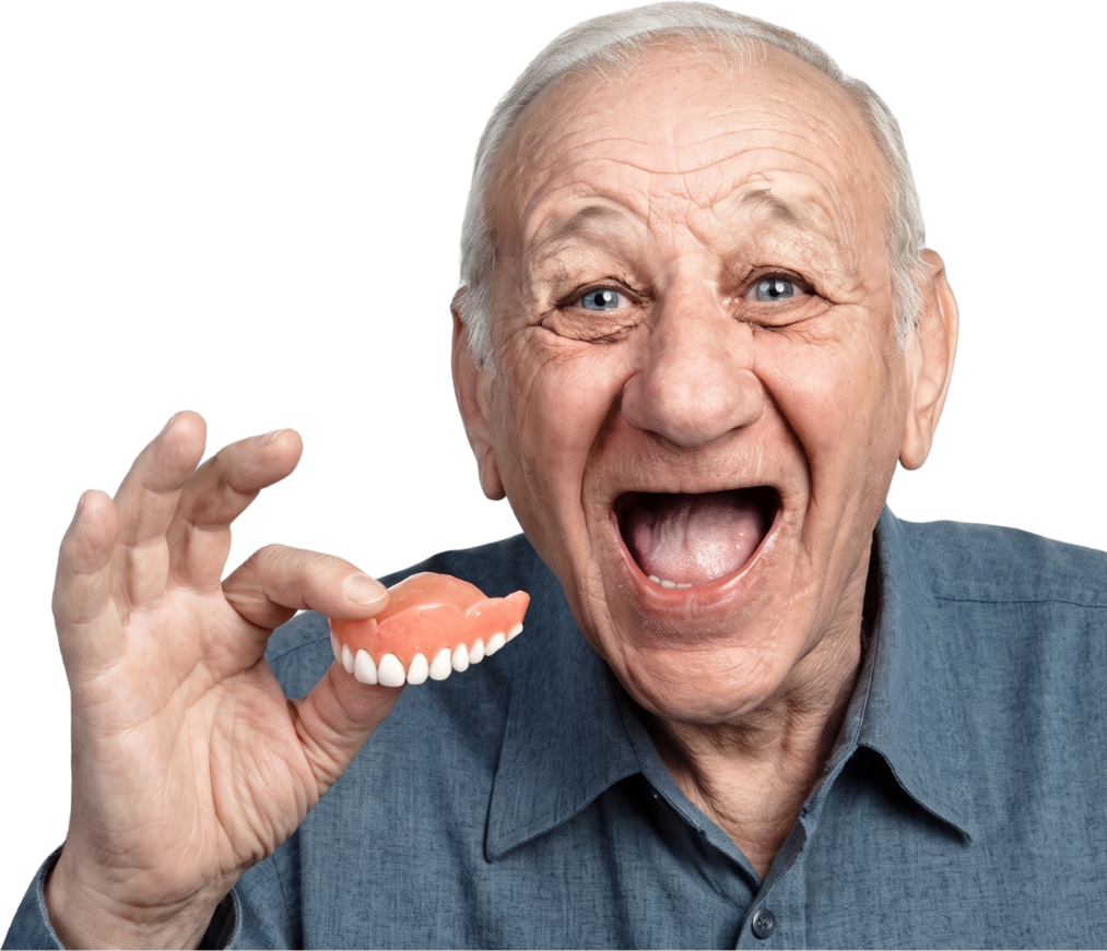 Smiling senior holding dentures