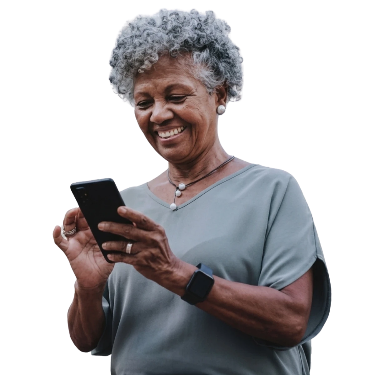 Smiling senior woman reading her phone